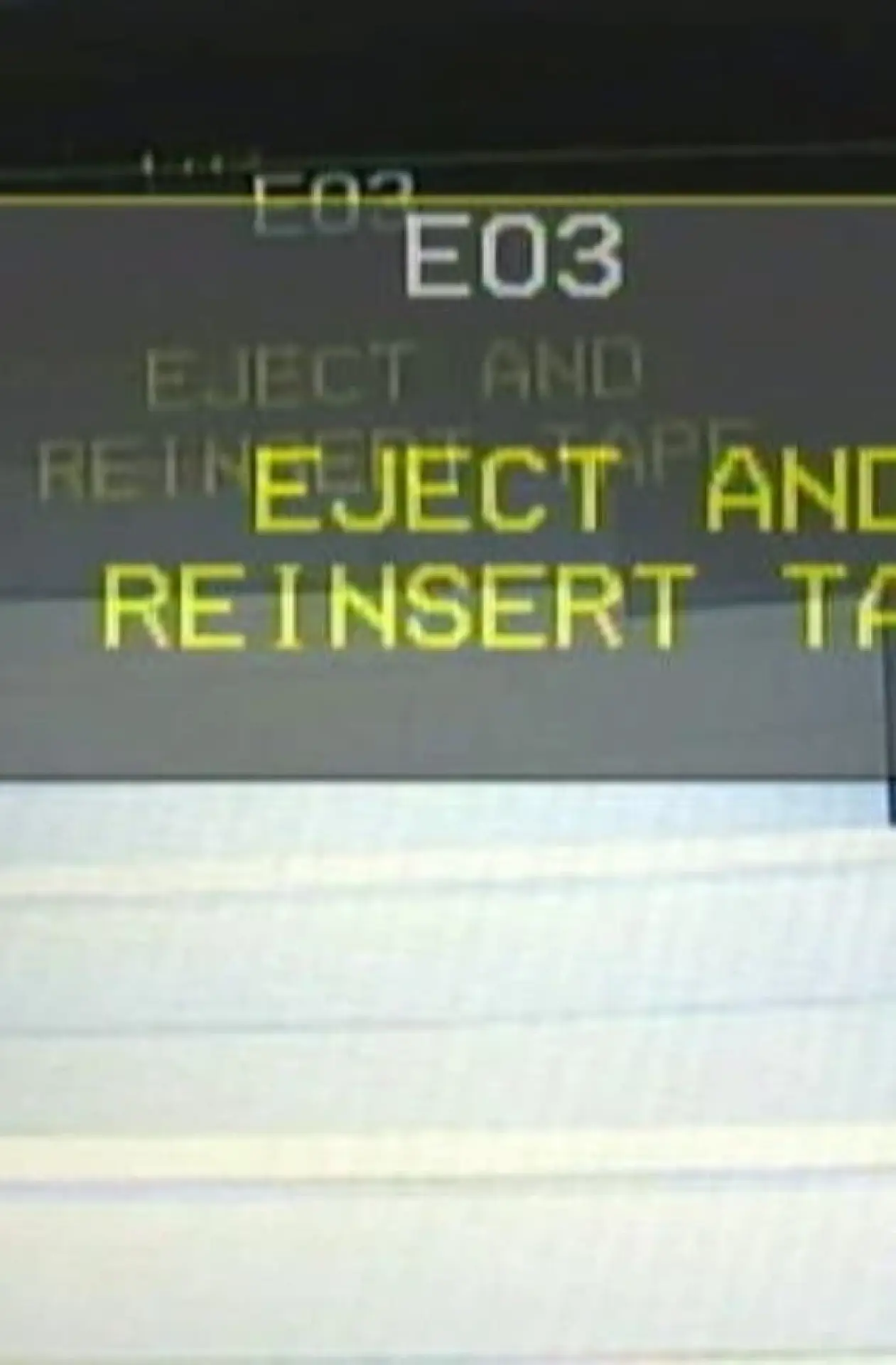 Movie poster "EJECT AND REINSERT TAPE"