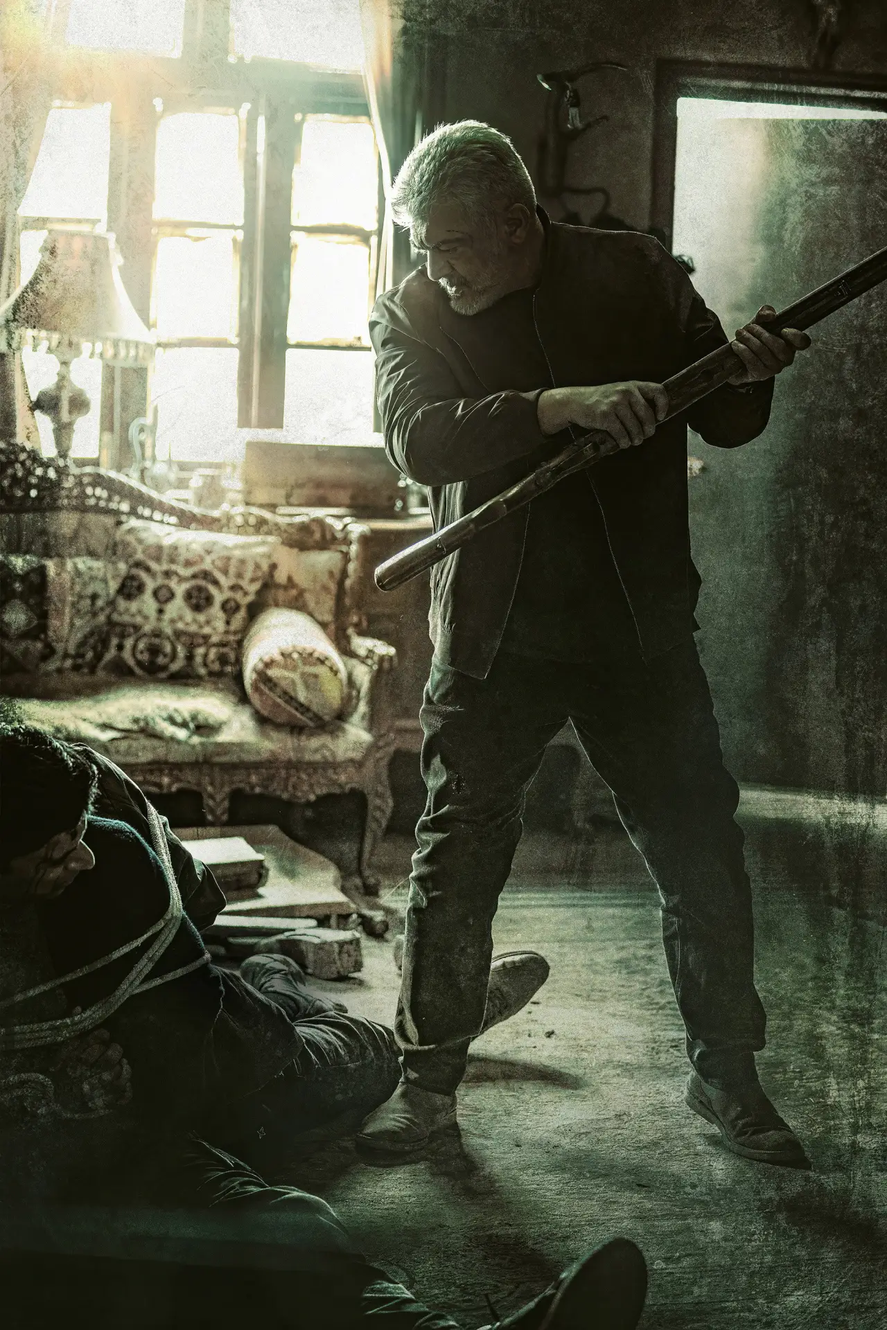 Movie poster "Vidaamuyarchi"