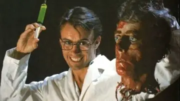 Backdrop to the movie "Re-Animator" #875474