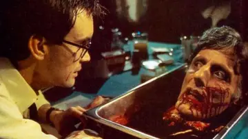 Backdrop to the movie "Re-Animator" #875489