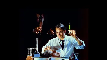 Backdrop to the movie "Re-Animator" #875500