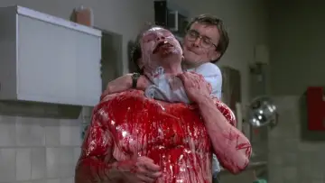 Backdrop to the movie "Re-Animator" #875533