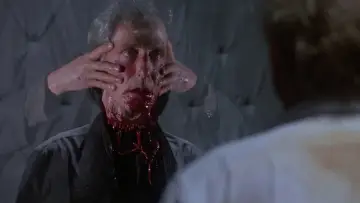 Backdrop to the movie "Re-Animator" #875535