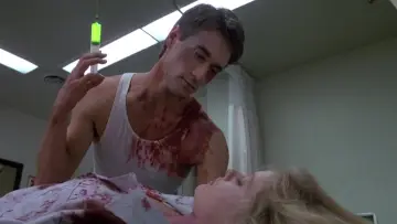 Backdrop to the movie "Re-Animator" #875537