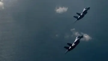 Backdrop to the movie "Top Gun" #580473