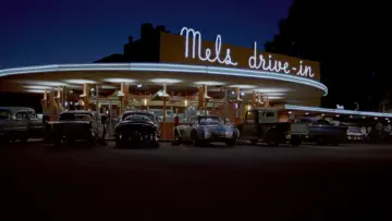 Backdrop to the movie "American Graffiti" #877863