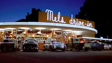 Backdrop to the movie "American Graffiti" #877865