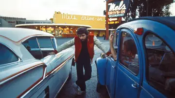 Backdrop to the movie "American Graffiti" #877877