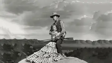 Backdrop to the movie "Westward the Women" #1064379