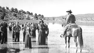 Backdrop to the movie "Westward the Women" #1064387