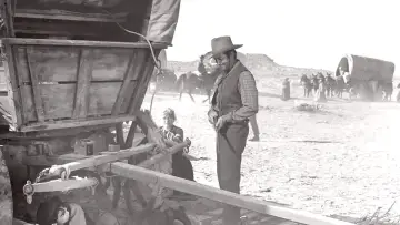 Backdrop to the movie "Westward the Women" #1064391