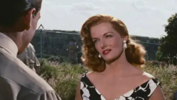 Backdrop to the movie "The Revolt of Mamie Stover" #1035659