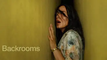 Backdrop to the movie "Backrooms" #1175926