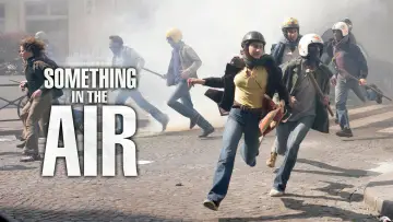 Backdrop to the movie "Something in the Air" #1123057