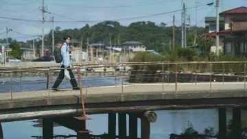 Backdrop to the movie "Living in Two Worlds" #883808