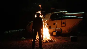 Backdrop to the movie "The Occupant" #585397