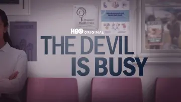 Backdrop to the movie "The Devil Is Busy" #618099