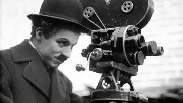 Backdrop to the movie "Chaplin et Les temps modernes, La voie du silence" #719633