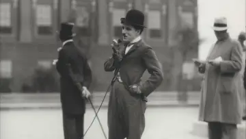 Backdrop to the movie "Chaplin et Les temps modernes, La voie du silence" #719635