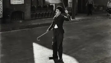 Backdrop to the movie "Chaplin et Les temps modernes, La voie du silence" #719636