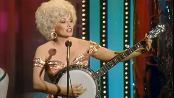 Backdrop to the movie "Dolly Parton : L