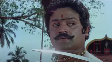 Backdrop to the movie "Oru Vadakkan Veeragatha" #1163107