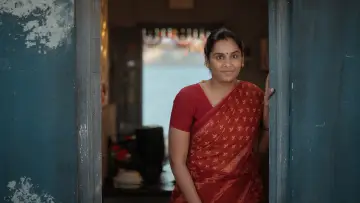 Backdrop to the movie "Carmeni Selvam" #844181