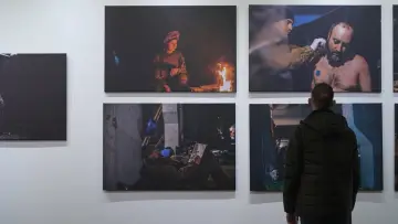 Backdrop to the movie "Світлини з війни" #1577928