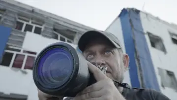 Backdrop to the movie "Світлини з війни" #1577929