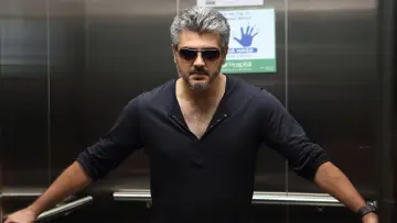 Backdrop to the movie "Arrambam" #1580475