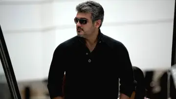 Backdrop to the movie "Arrambam" #1580477