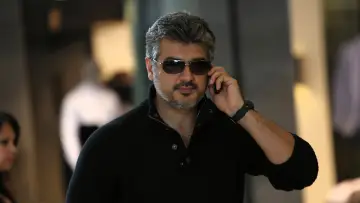 Backdrop to the movie "Arrambam" #1580486