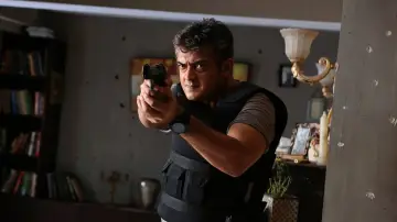 Backdrop to the movie "Arrambam" #1580505