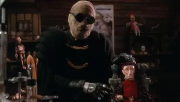 Backdrop to the movie "Puppet Master II" #392304