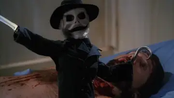 Backdrop to the movie "Puppet Master II" #392307
