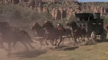 Backdrop to the movie "The War Wagon" #389232