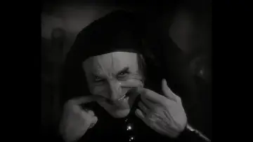 Backdrop to the movie "The Man Who Laughs" #1080080