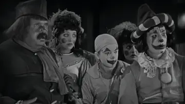 Backdrop to the movie "The Man Who Laughs" #1080082