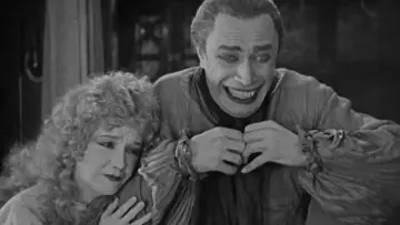 Backdrop to the movie "The Man Who Laughs" #1080084