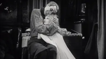 Backdrop to the movie "The Man Who Laughs" #1080086