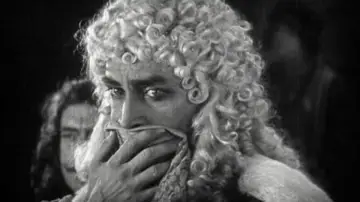 Backdrop to the movie "The Man Who Laughs" #1080088