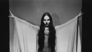 Backdrop to the movie "Mark of the Vampire" #1579114