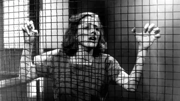 Backdrop to the movie "Caged" #1103587