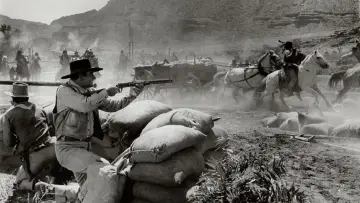 Backdrop to the movie "The Comancheros" #906293