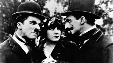 Backdrop to the movie "The Tramp" #1146363