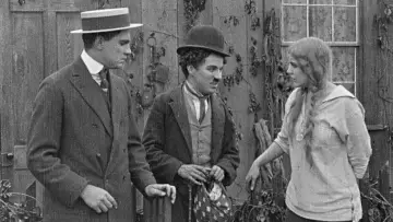 Backdrop to the movie "The Tramp" #1146365