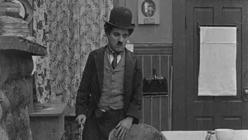 Backdrop to the movie "The Tramp" #1146370