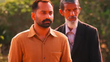 Backdrop to the movie "Iyobinte Pusthakam" #1622689