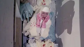 Backdrop to the movie "Killer Nun" #498390