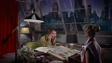 Backdrop to the movie "Artists and Models" #1062885